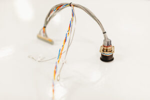 Aerospace-grade cable solutions are like the skeletons of airplanes. They connect cables and wires to provide everything gets power, signals, and data. Must be strong to handle things like extreme heat, lots of shaking, and heavy electricity.